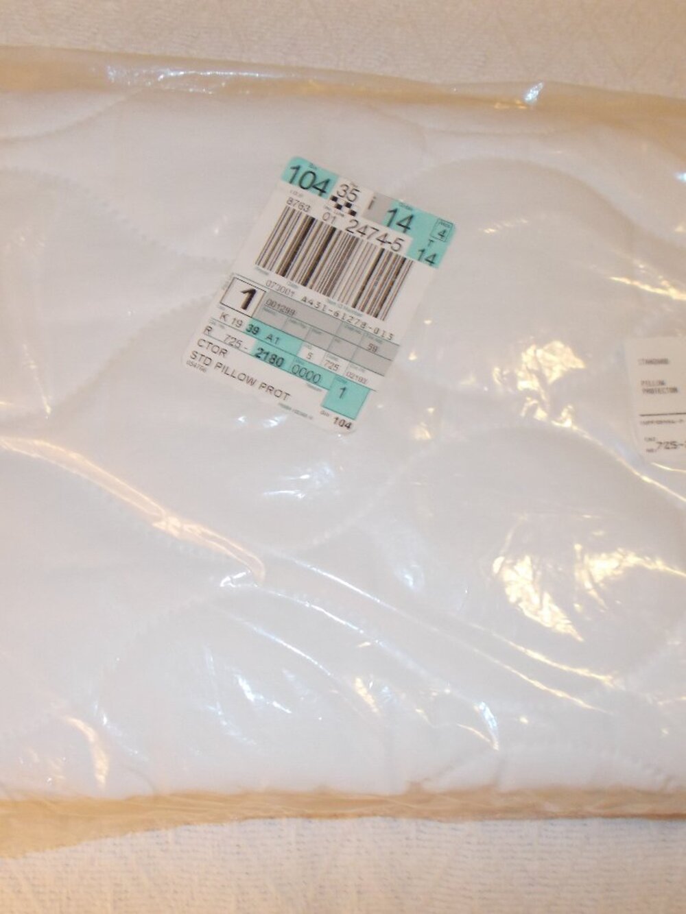 NIP Two standard size pillow protectors with zippers, white